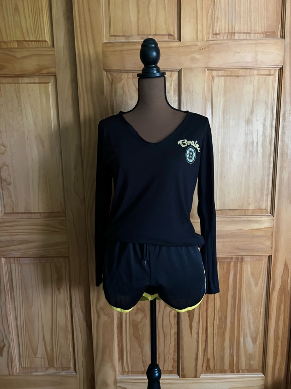 NHL Women's Long Sleeve Black Tee with Boston Bruins Logo